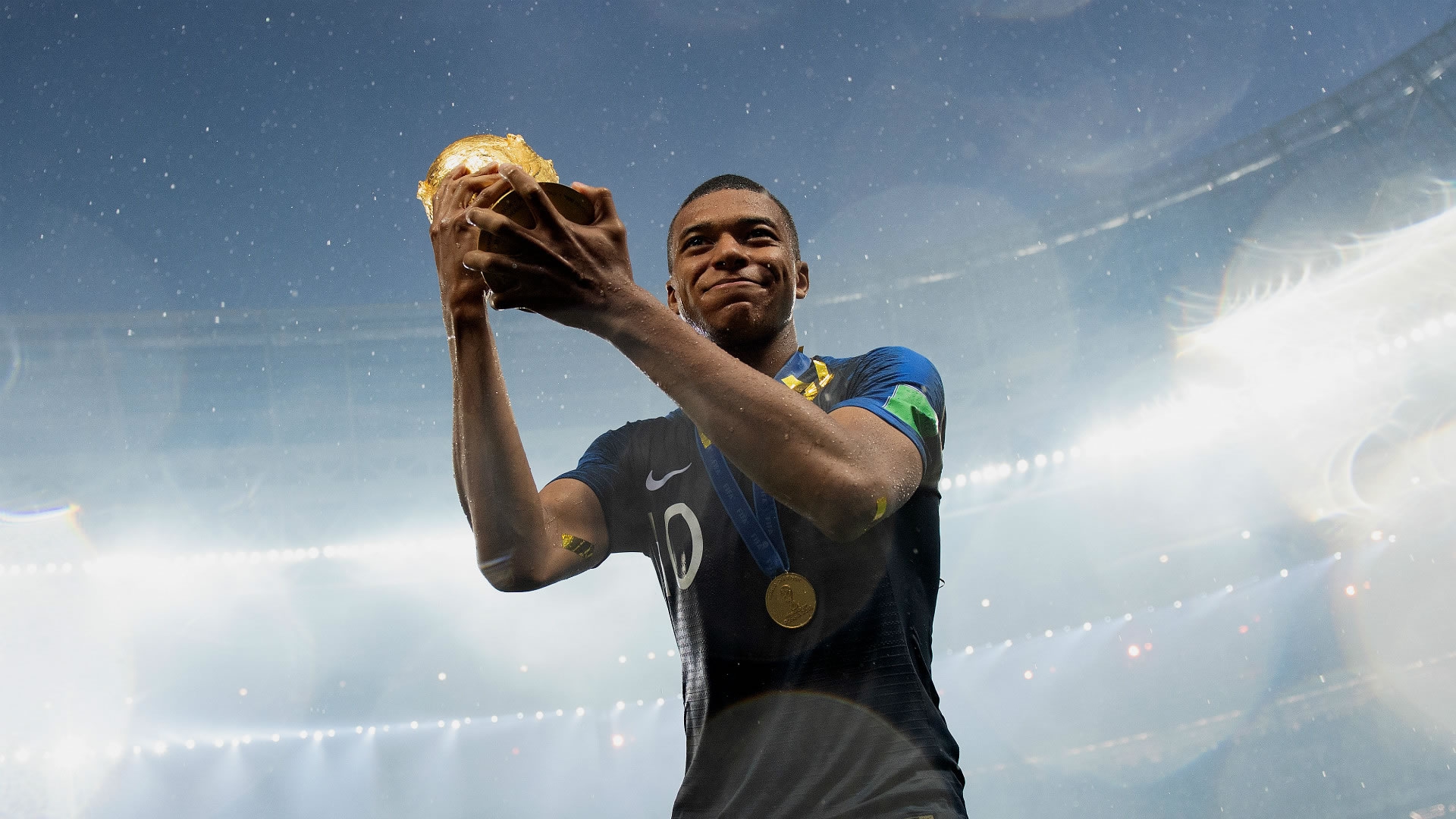 Kylian Mbappé and our cup doll